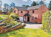 Coach house in price drop
