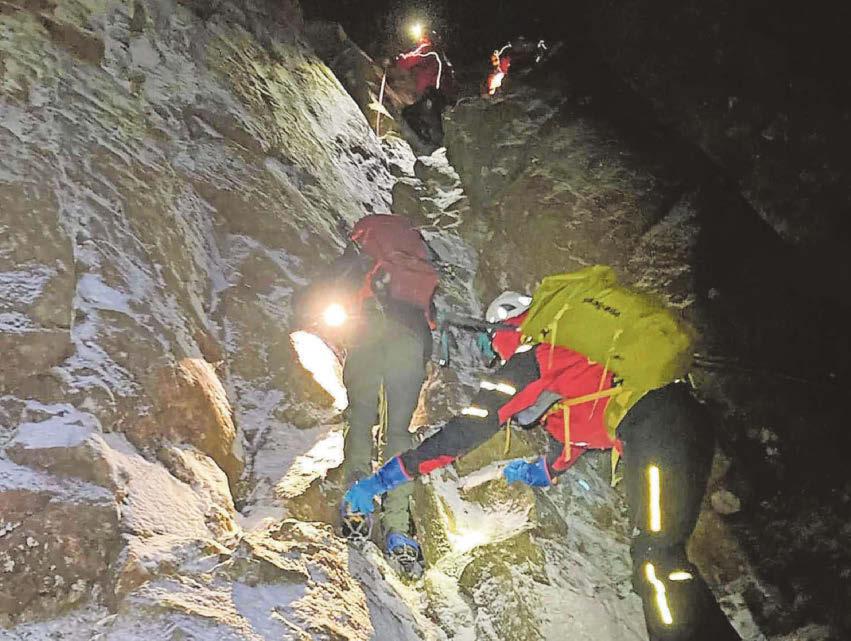 Family rescued after getting stuck on peak