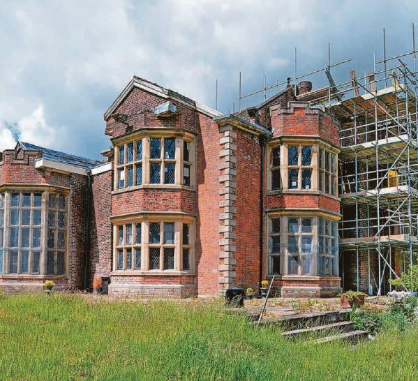 Roof restoration works continue at historic hall