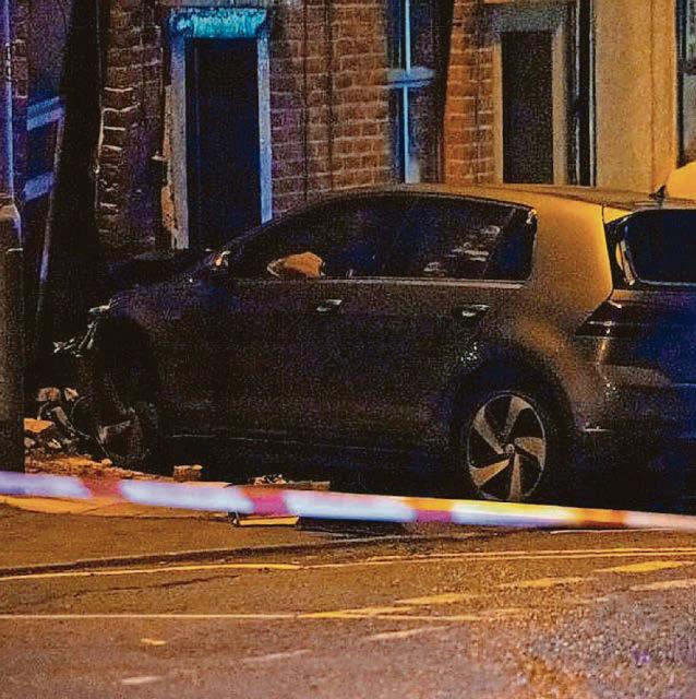 Scene of devastation as Golf GTI crashes into home