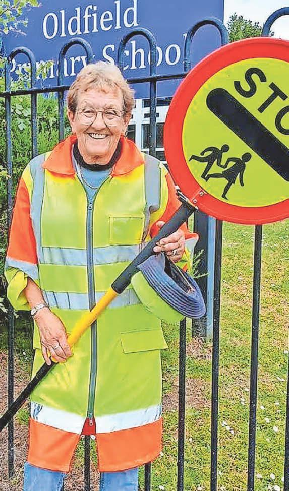 Pat marks 28 years as a school lollipop lady