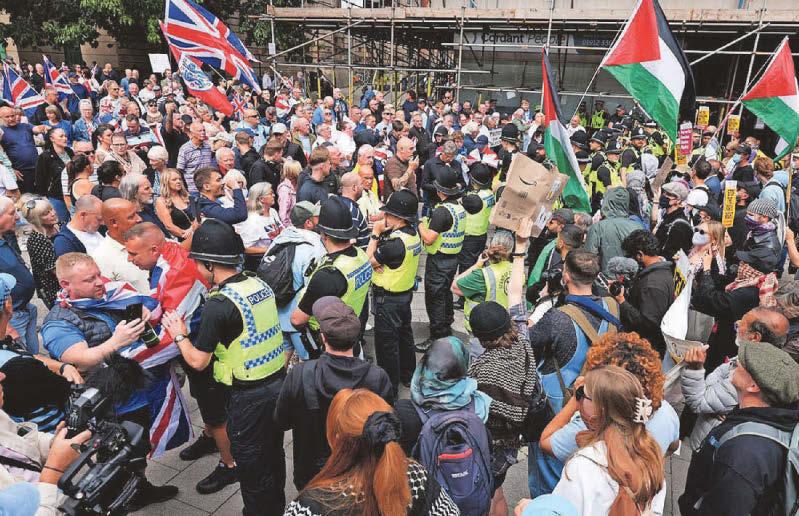 Protesters clash over asylum seeker hotels