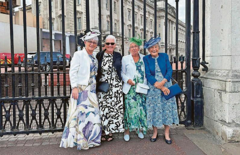 Heath community volunteers enjoy a royal garden party