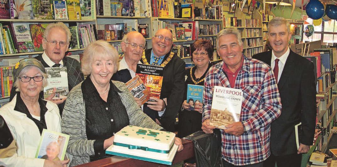 Tributes to popular author and bookshop owner Liz