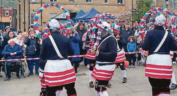 We will not 'cower' to pressure to stop blacking faces, says dance group