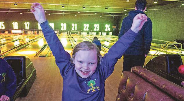 Children bowled over by fun and games at alley