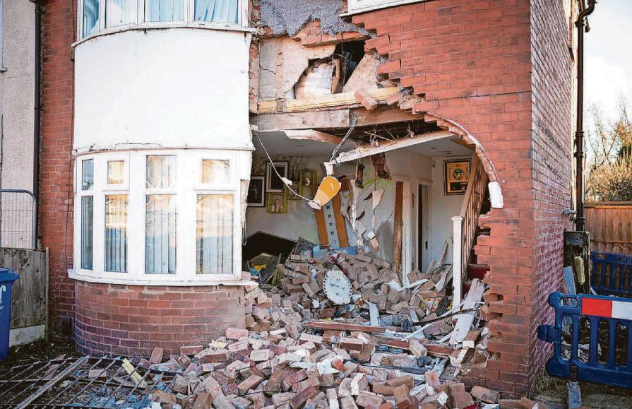 House is wrecked by stolen Mercedes