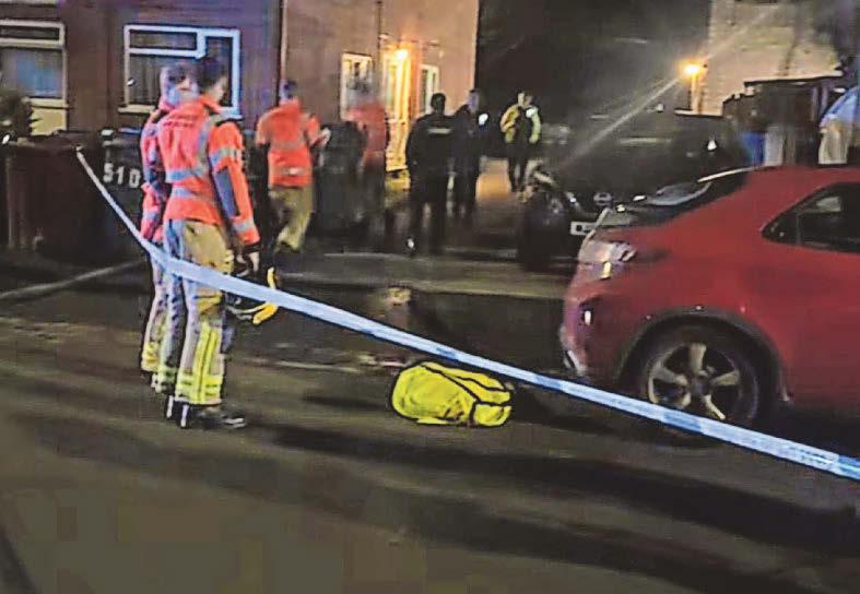 Cops arrest man after rooftop stand-off