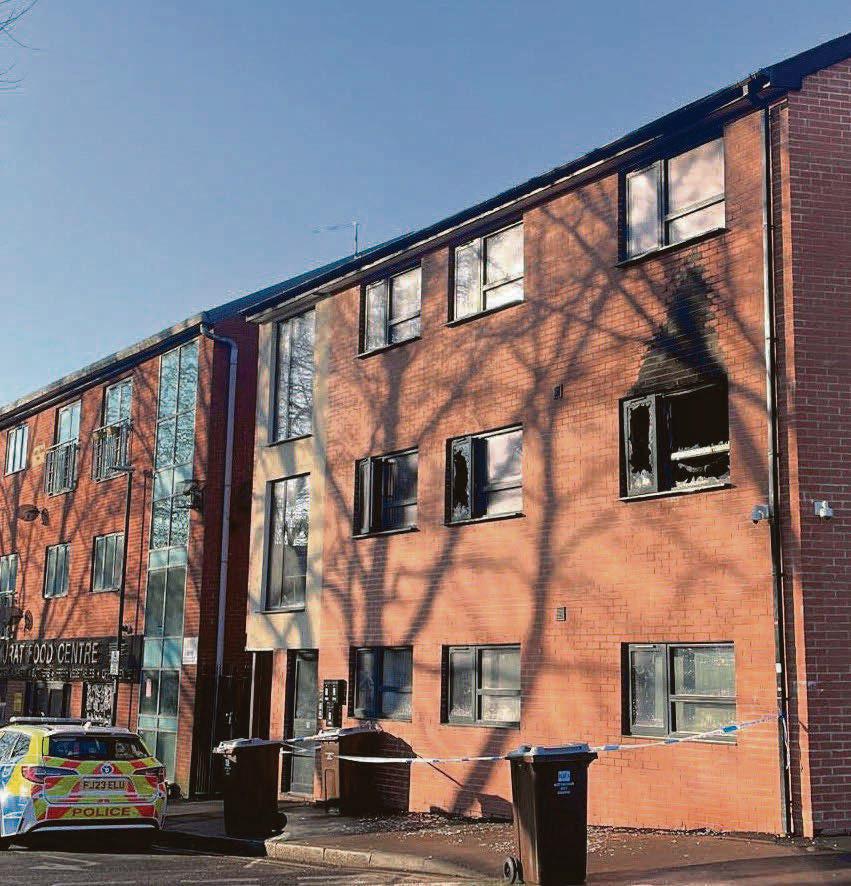 Man arrested on suspicion of arson after flat blaze