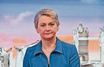 UK will host summit on people smuggling