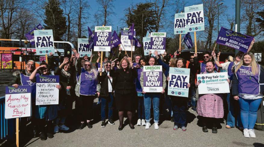 Hospital workers strike as city NHS trust urged to make deal