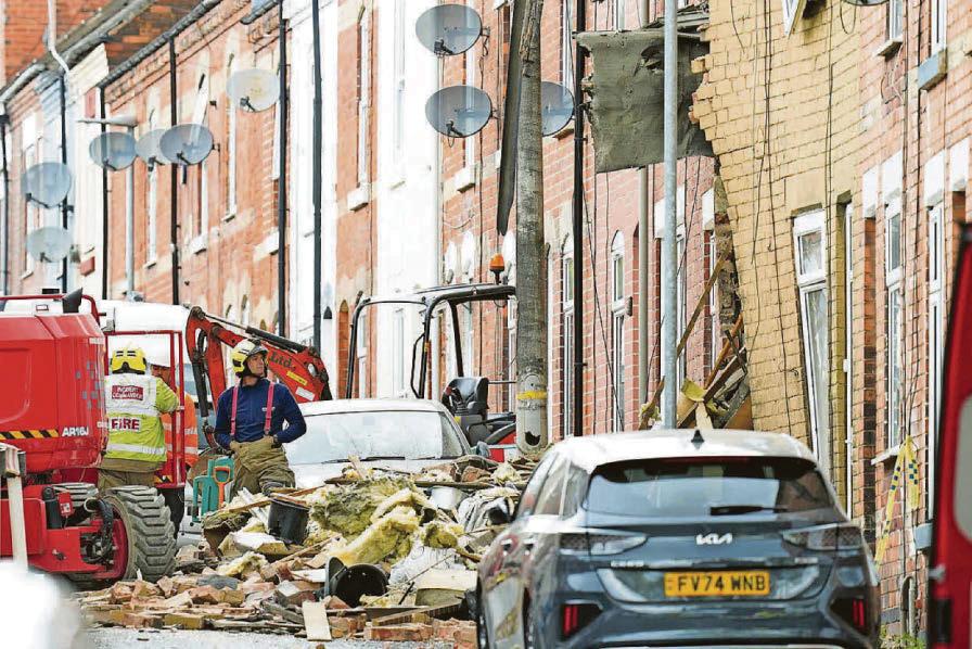 Man arrested over house explosion that killed dad