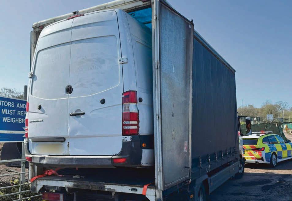 Driver stopped for van sticking out of lorry