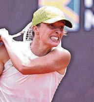 Swiatek gets back on track