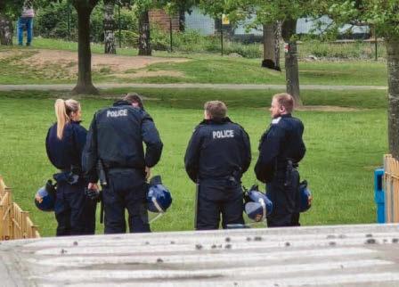 Man arrested after he is talked down from roof