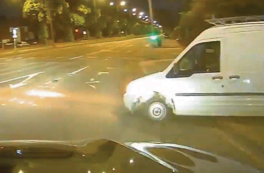 Sparks fly as police pursue van on wrong side of road