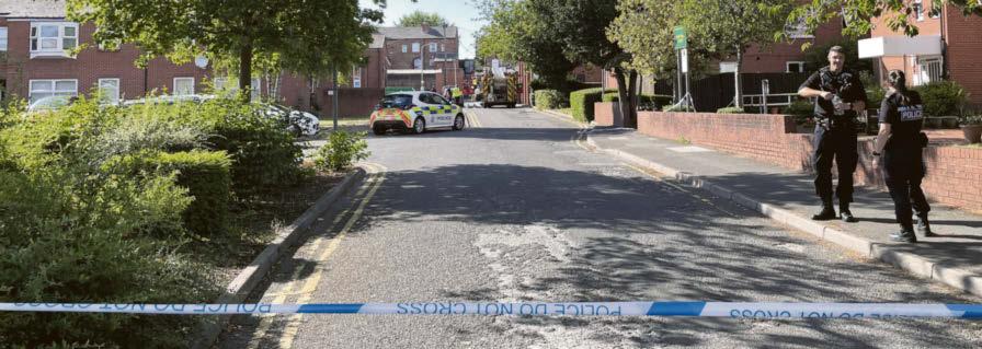 Elderly woman taken to hospital after flat blaze