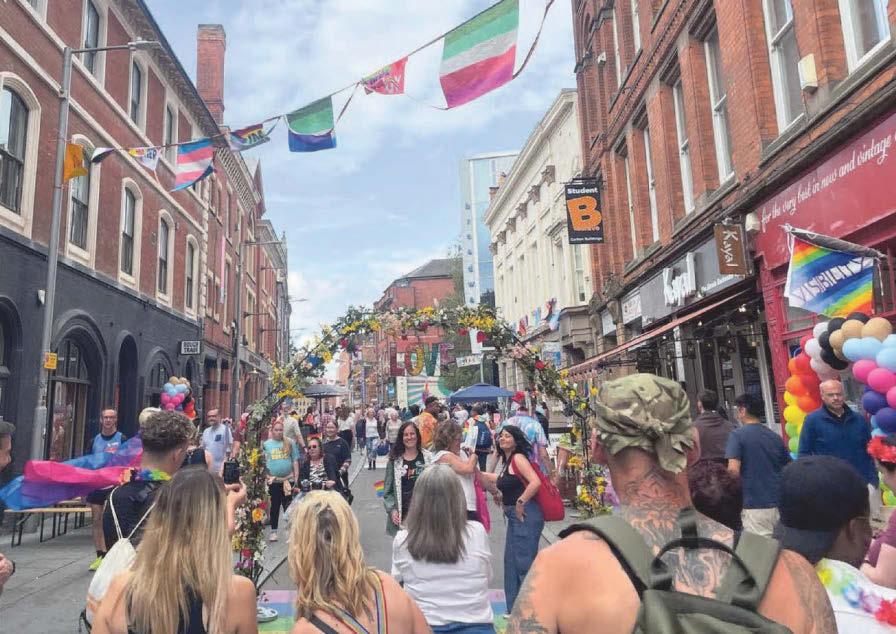 Joyful Pride crowd bats away criticism of city's new Rainbow Quarter