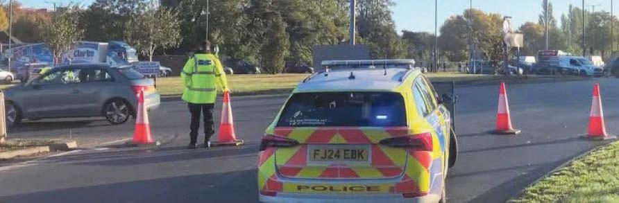 Two taken to hospital after crash shuts major road in city