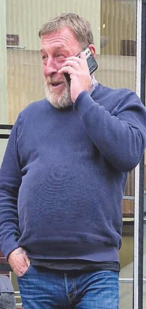 Thug told his neighbour: 'I'm coming to kick your head in'