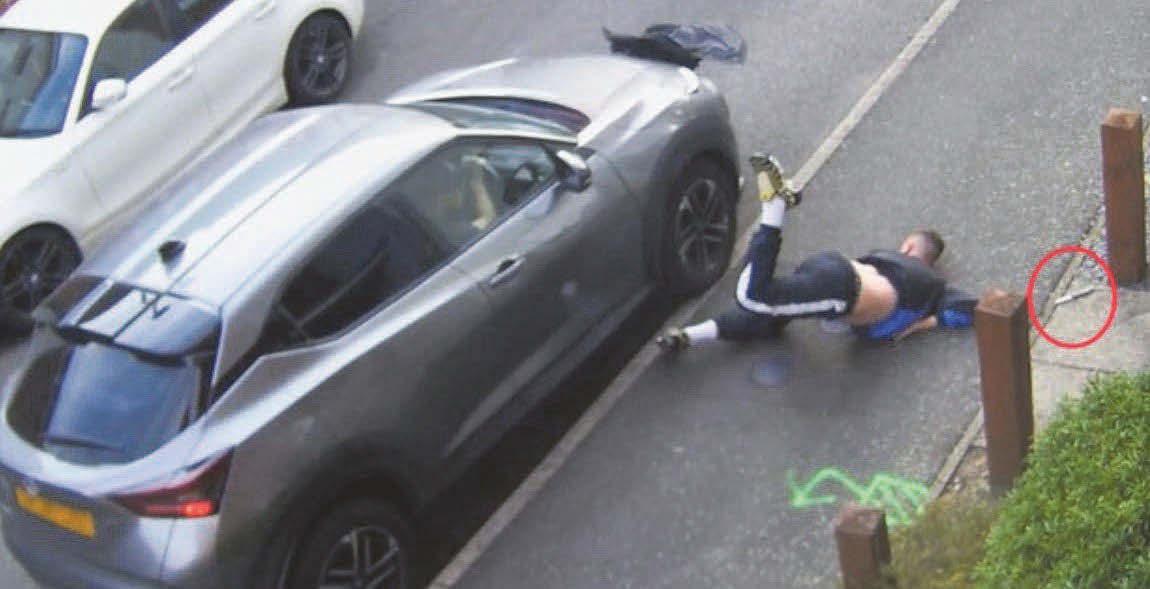 Knife-wielding thug run over twice during brawl in street