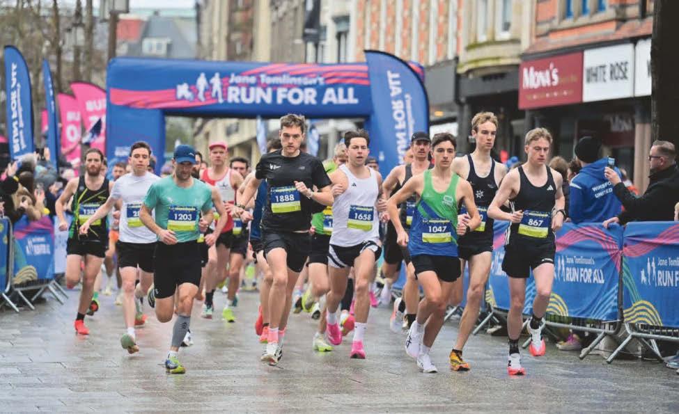 Runners pound city streets to raise thousands