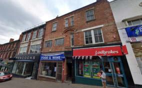 Plans to build extra floor on high street building to create flats