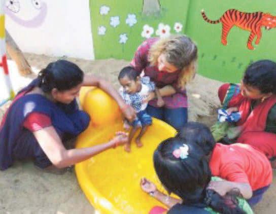 Doctor who has helped lives of thousands of children hails her training at city university