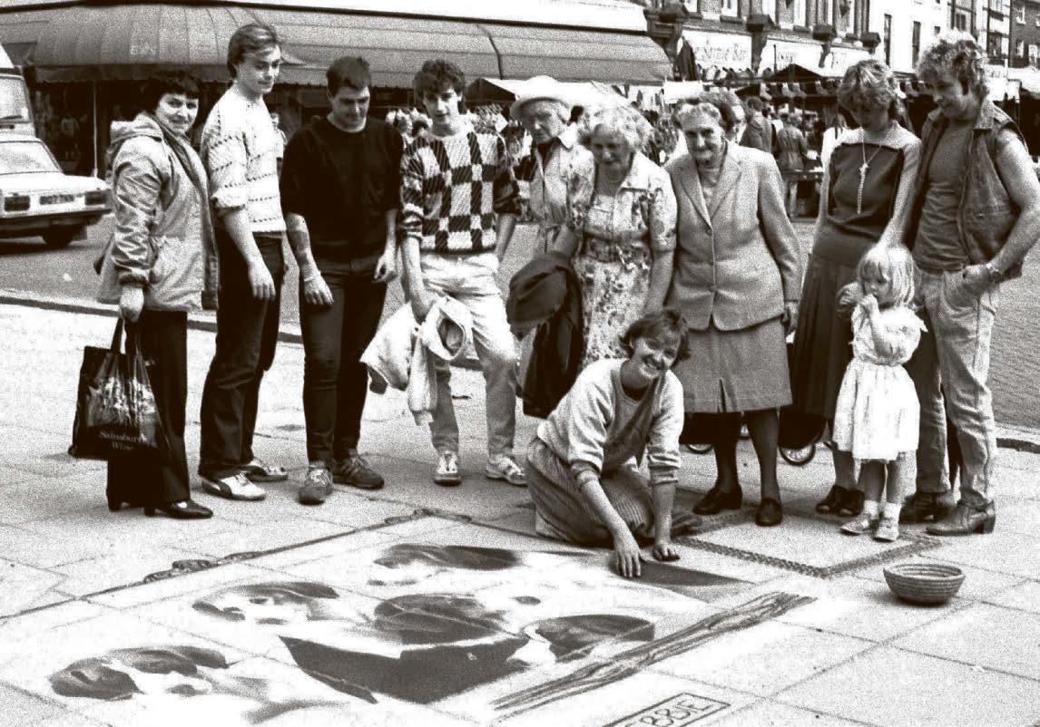 Street artist delighted the crowds with her drawings