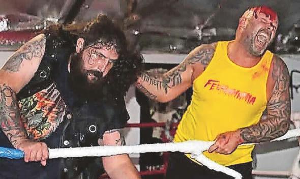Gym-goers grapple for glory in wrestling ring!