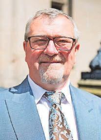 Burton Reform councillor is sorry for social media posts about black women and cops