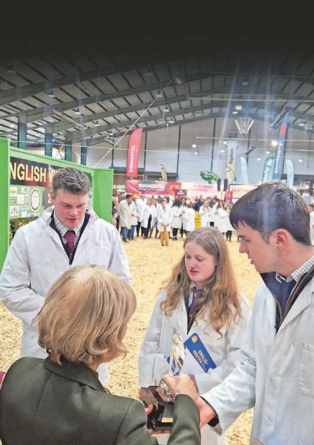 Young farm team lifts top winter fair trophy for county