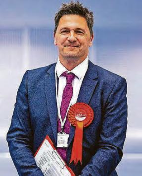 MP silent on bowing to 'quit second role' pleas