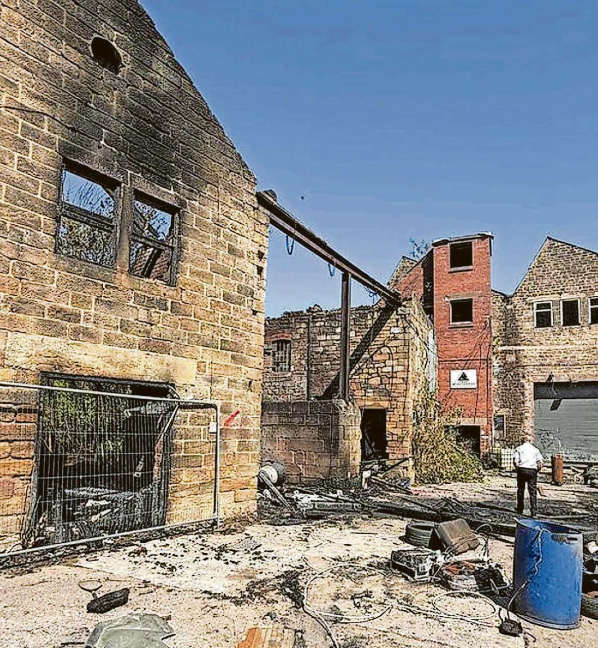 Part of arson-hit mill complex set to be razed to ensure safety