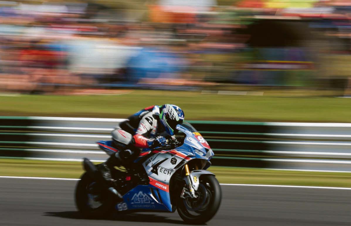Bike racer remains in coma following crash