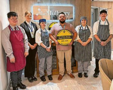 Students serve up a treat to claim AA College Rosette for bistro work