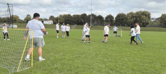 Social care clients get stuck in for sports day