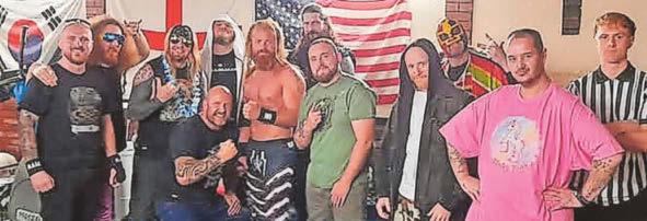 Sell-out crowd enjoys a wrestling spectacle in place of martial arts