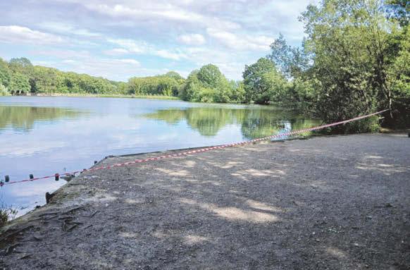 Oil spill prompts call to 'stay away' from pond