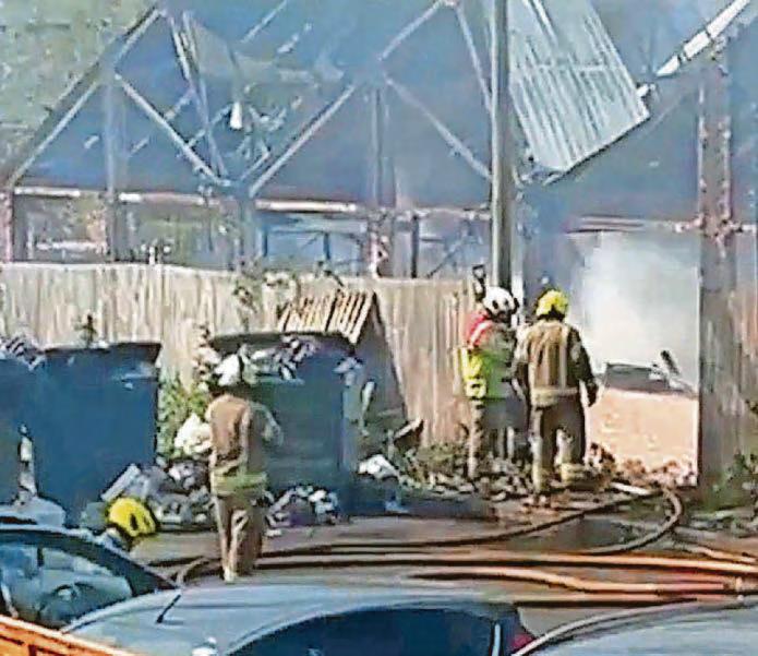City road still closed following factory fire