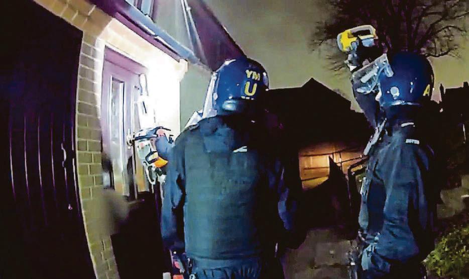 Cops chainsaw way into suspect's home