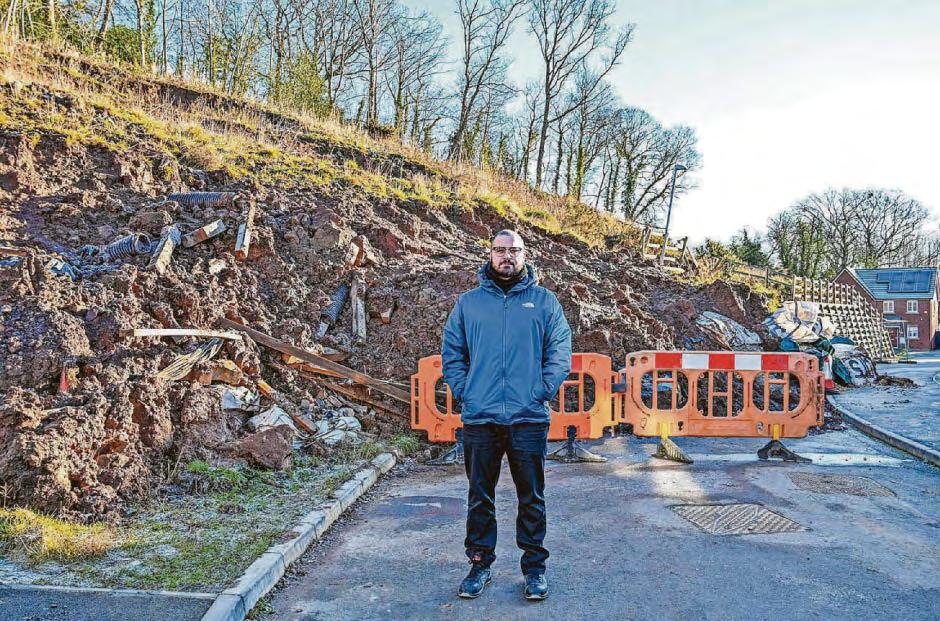 Fears over homes after landslip blocks road