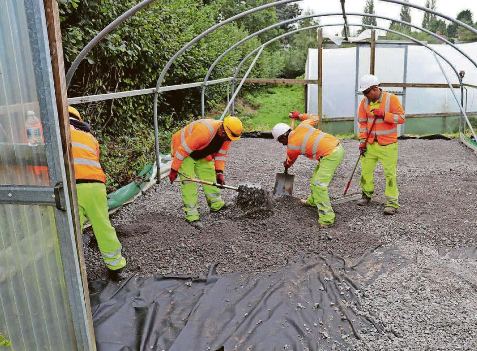 M6 workers dig deep to create garden oasis