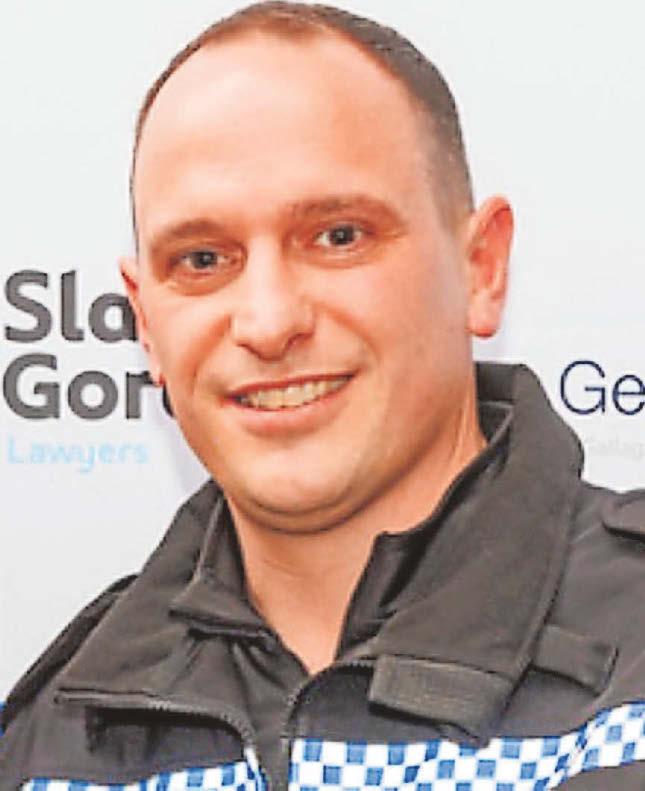 Bravery award for cop who fought off 2 dogs