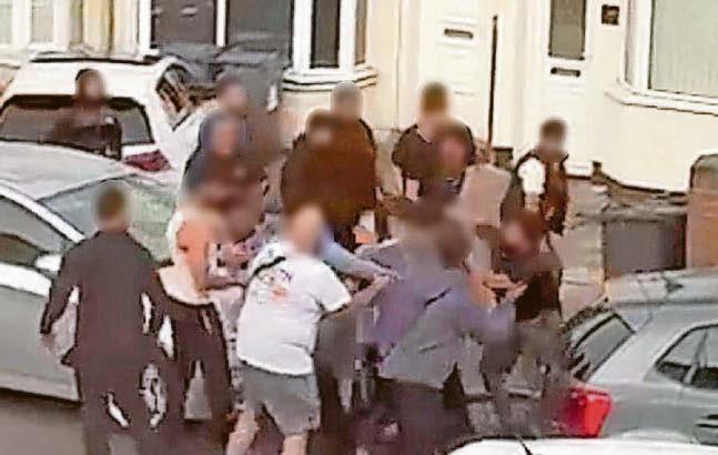 Knife wielded in mass street fight