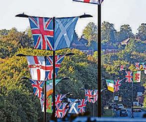 Group uses cherry picker to erect 'patriotic display'