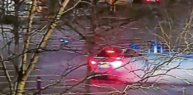 Yob caught on camera clinging to car bonnet