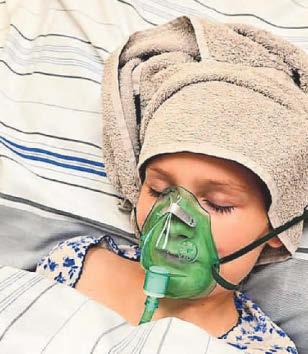 Girl fights for life after airlift back to Brum