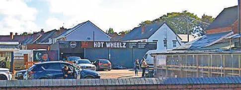 Car wash to demolish building put up without permission