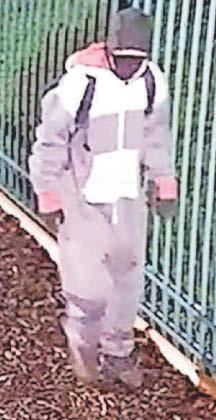 Onesie man sought over school raid